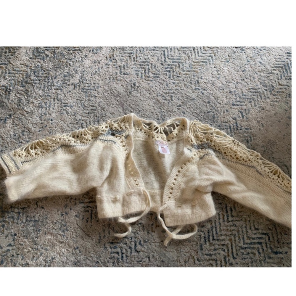 Cropped cardigan. Beautiful stitching and detail
